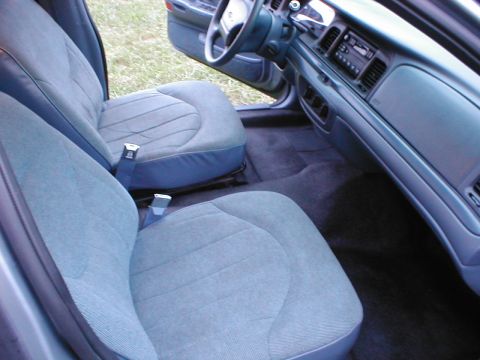 1997 Ford Crown Victoria - Interior view of a 1997 Ford Crown Victoria, showing the seats and dashboard.