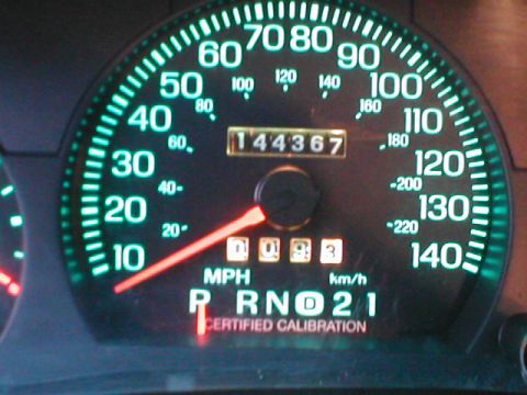 1997 Ford Crown Victoria - Vehicle's dashboard displays the speedometer, odometer, and gear selection indicator.