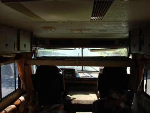 1983 Ford Bronco - This motorhome has a twin front drop bunk. i moved the extra room storage to the bunk and this dropped it down an inch-just enough for the…