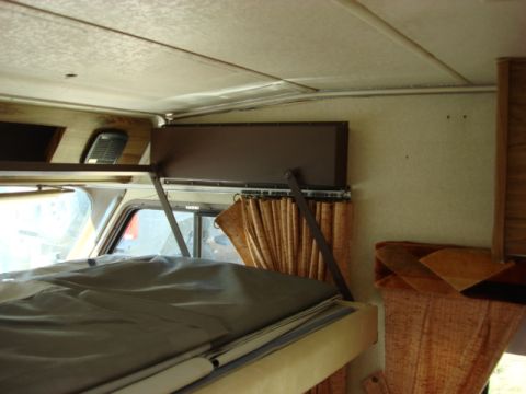 1983 Ford Bronco - Here is the bunk dropped down. you can see the spare room on the bunk.