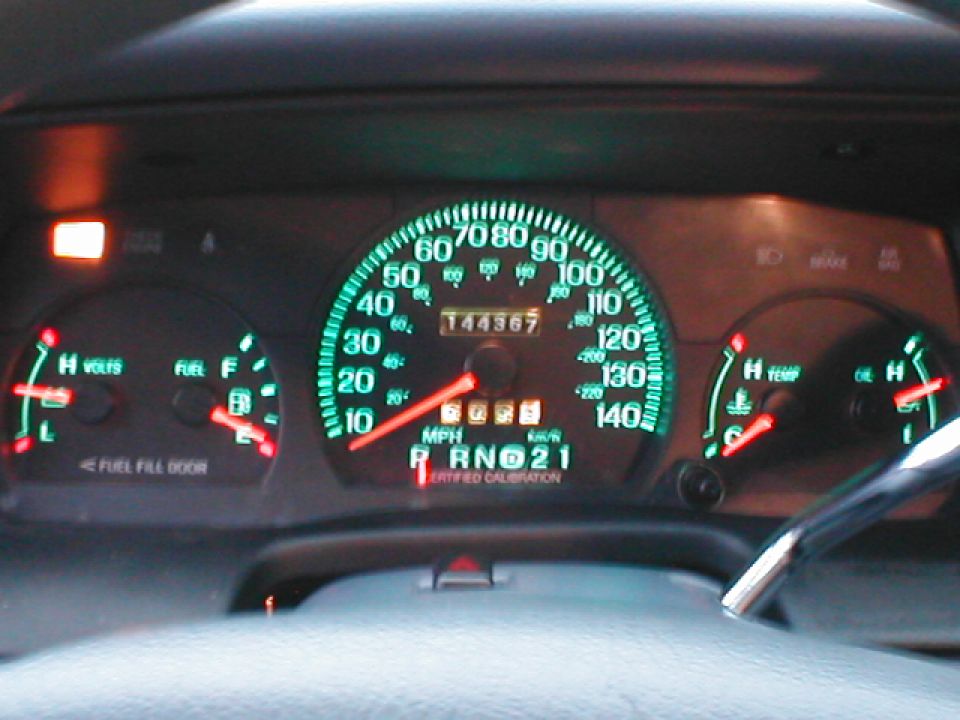 Dashboard gauges with speedometer, fuel, volts, and temp. Odometer shows 144367