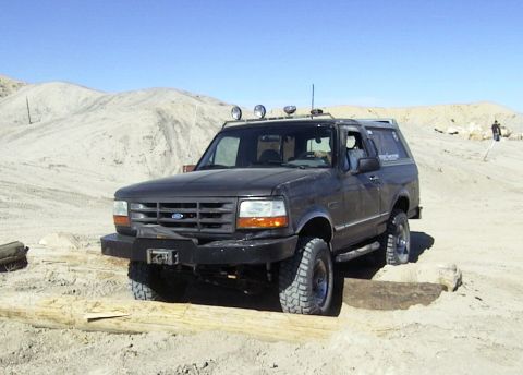 1994 Ford Bronco - This Ford Bronco is shown off-road with a custom bumper and light bar.