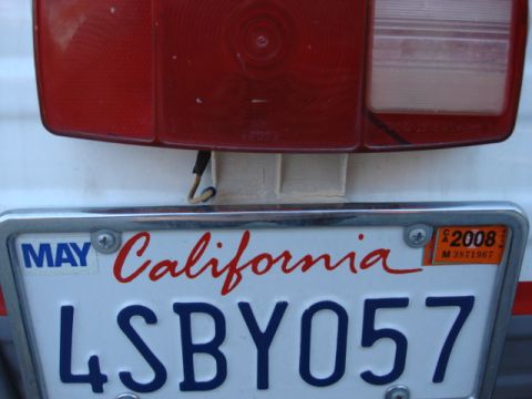 1983 Ford Bronco - This is the stock plat holder and it is faling apart. i plan on a new bumper and will make a better mount but i need a temp fix for now.