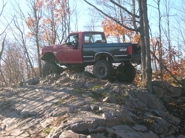 1994 Ford F-250 off-roading on rocks