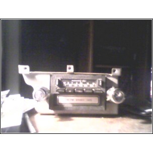 1973 Ford Ranchero - A car radio unit is shown, likely from a vintage vehicle.