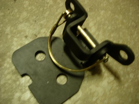 1985 Toyota Hilux - Close-up of a vehicle door latch part, possibly for a Toyota Hilux.