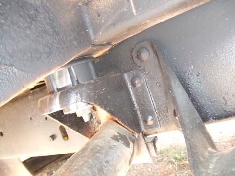 1979 Ford Bronco - Undercarriage view of a vehicle's frame and suspension components, showing bolted brackets.