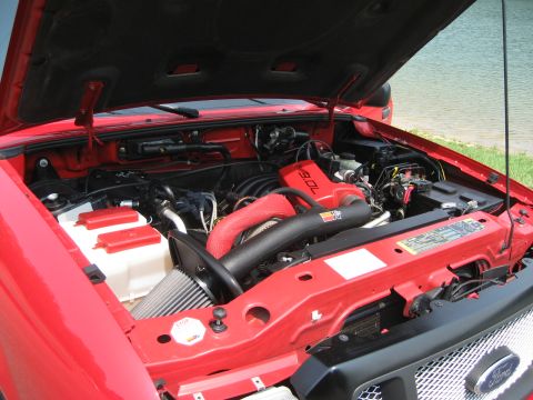 2004 Ford Ranger - The engine bay of a 2004 Ford Ranger, a 3.0L engine and K&N air intake system.