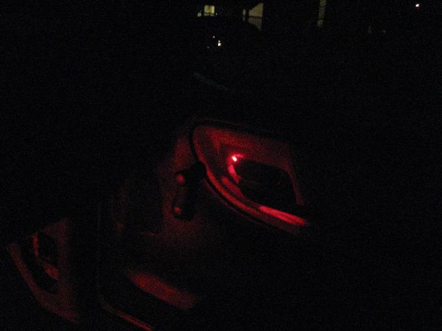 Close-up of a red taillight with internal details visible