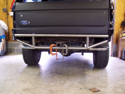1983 Ford Bronco - The rear of a Ford Bronco is shown with a custom bumper and tow hitch assembly.