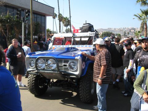 1994 Ford Bronco - A modified first-generation Ford Bronco, likely from the 1960s, is prepared for an off-road race.