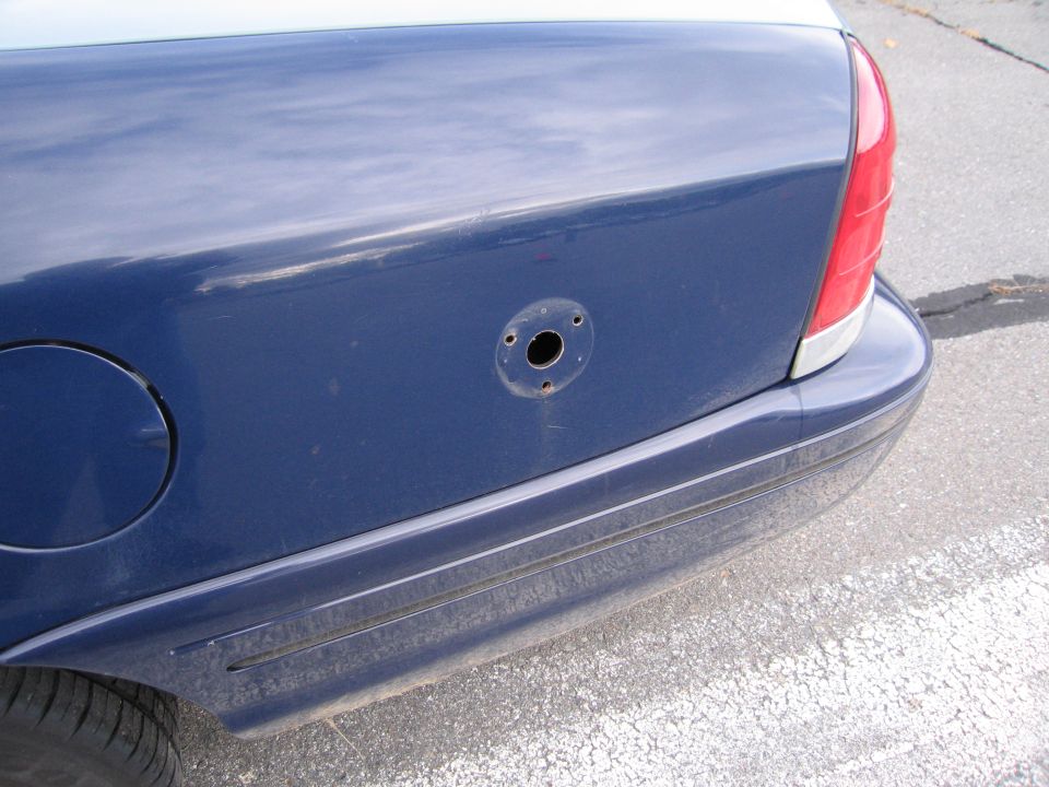 Blue 1991 Ford Crown Victoria LTD rear quarter panel with fuel door and missing antenna mount