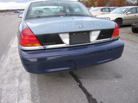 1991 Ford LTD Crown Victoria - Rear view of a Ford Crown Victoria Police Interceptor showing the trunk lid with STATE POLICE markings.