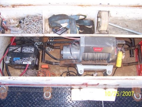1995 Ford Bronco - Toolbox contents include a Warn winch, battery, chains, and straps. Photo dated 10/25/2007.
