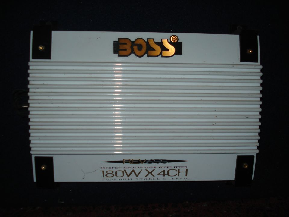 BOSS audio amplifier with "180W X 4CH" printed on it