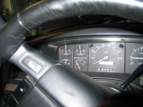 1994 Ford Bronco - Interior view of a 1994 Ford Bronco dashboard, showing gauges and steering wheel.
