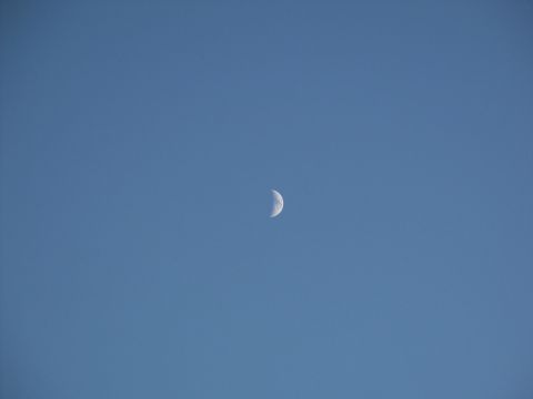 2001 Mercury Grand Marquis - A crescent moon hangs in the daytime sky, accompanied by a website URL at the bottom.