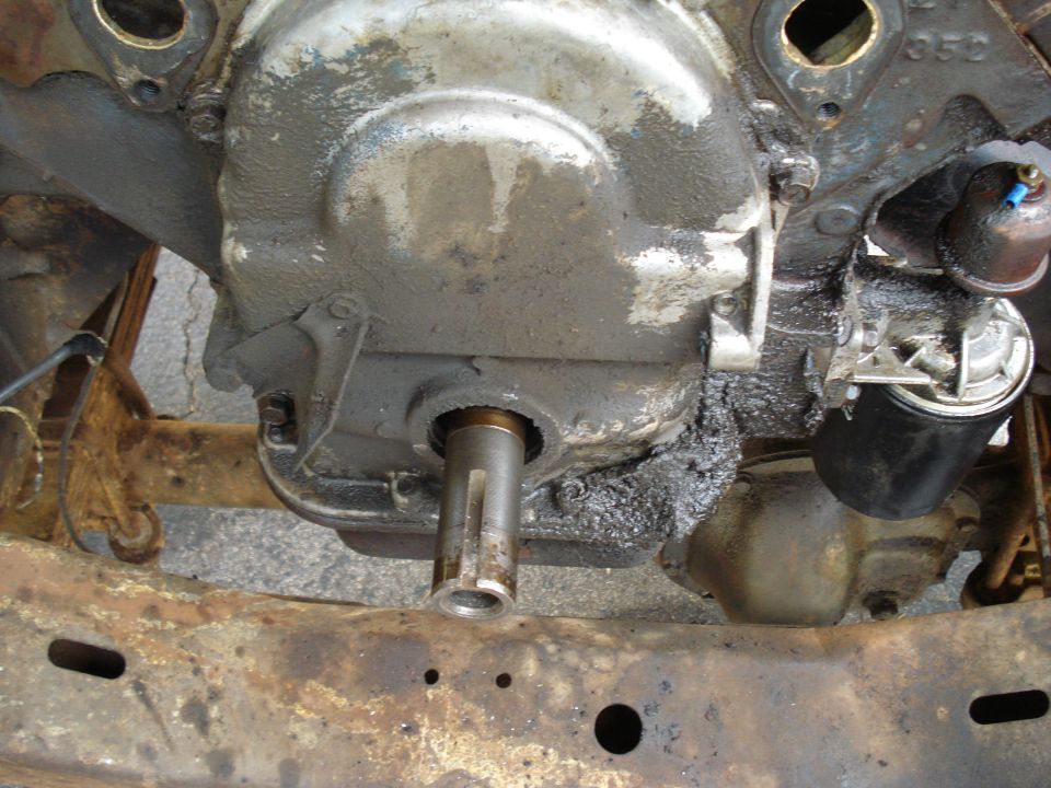 Engine block with exposed crankshaft seal area and oil filter attached