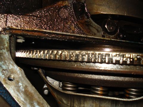 1967 Ford F-250 - Close-up view of an engine's flywheel and starter gear, showing mechanical components.