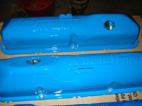1967 Ford F-250 - Pair of blue painted valve covers with "POWER BY FORD" embossed lettering, likely for a Ford engine.