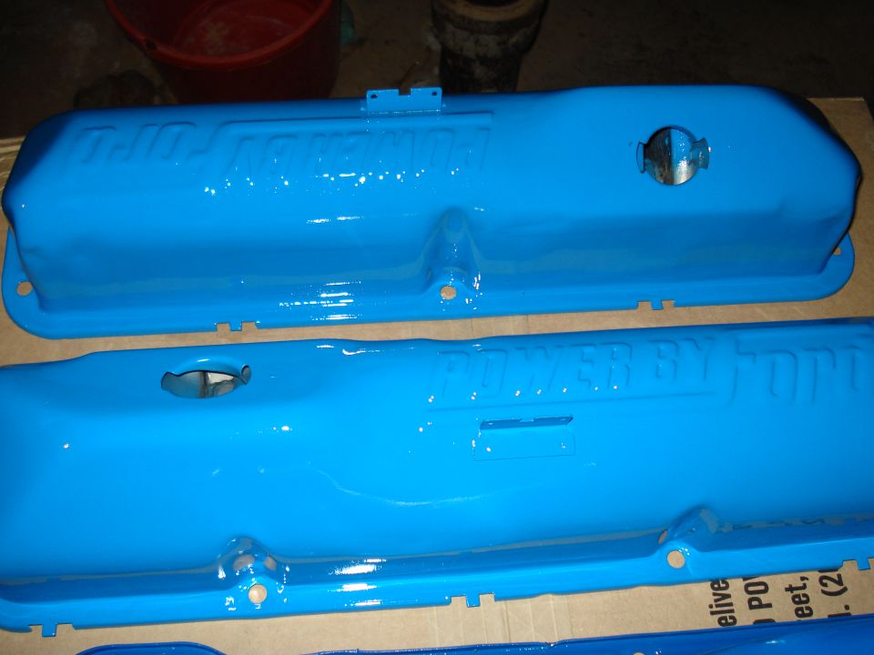 Blue valve covers with "POWER BY FORD" embossed text
