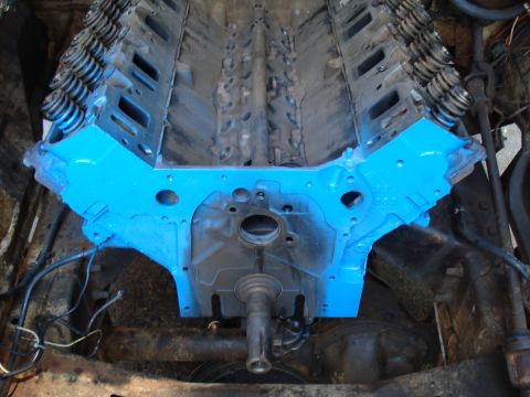 1967 Ford F-250 - A V8 engine block, painted blue, is shown from an overhead perspective.
