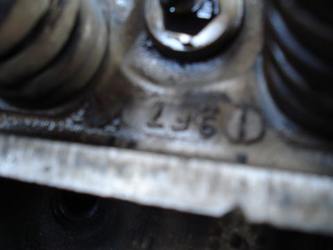 1967 Ford F-250 - Close-up of an engine block casting showing a stamped number, possibly indicating the year of manufacture.