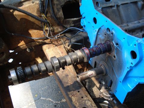 1967 Ford F-250 - Camshaft installed in a blue engine block, part of a vehicle engine rebuild.