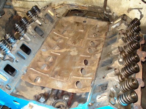 1967 Ford F-250 - Close-up view of an engine block, showing valve springs and the internal structure of the cylinder heads.
