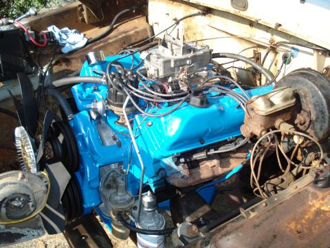 1967 Ford F-250 - Close-up view of a vehicle's engine bay, showing the engine and associated components.