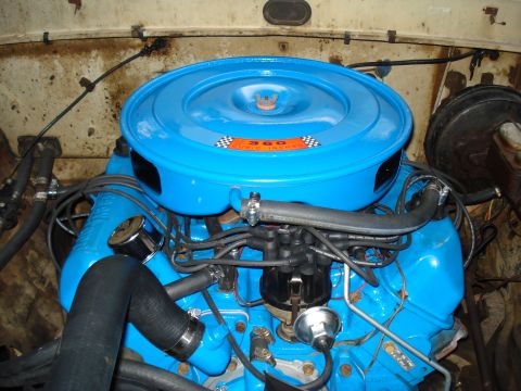 1967 Ford F-250 - Engine bay view of a 1967 Ford F-250's 360 V8 engine, identified by the air cleaner label.