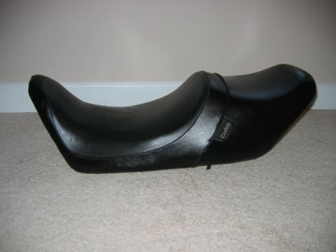 1985 Ford LTD Crown Victoria - Corbin motorcycle seat shown on a carpeted floor.