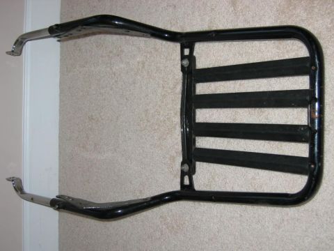 1985 Ford LTD Crown Victoria - This black luggage rack with chrome accents is a versatile accessory for various vehicles.