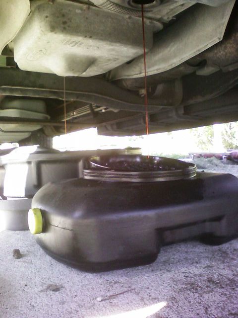 2001 Ford F-150 - Draining the Pan and Torque converter. Supposedly after late 01 they stopped putting drain plugs in the torque converter. To get to the dra…
