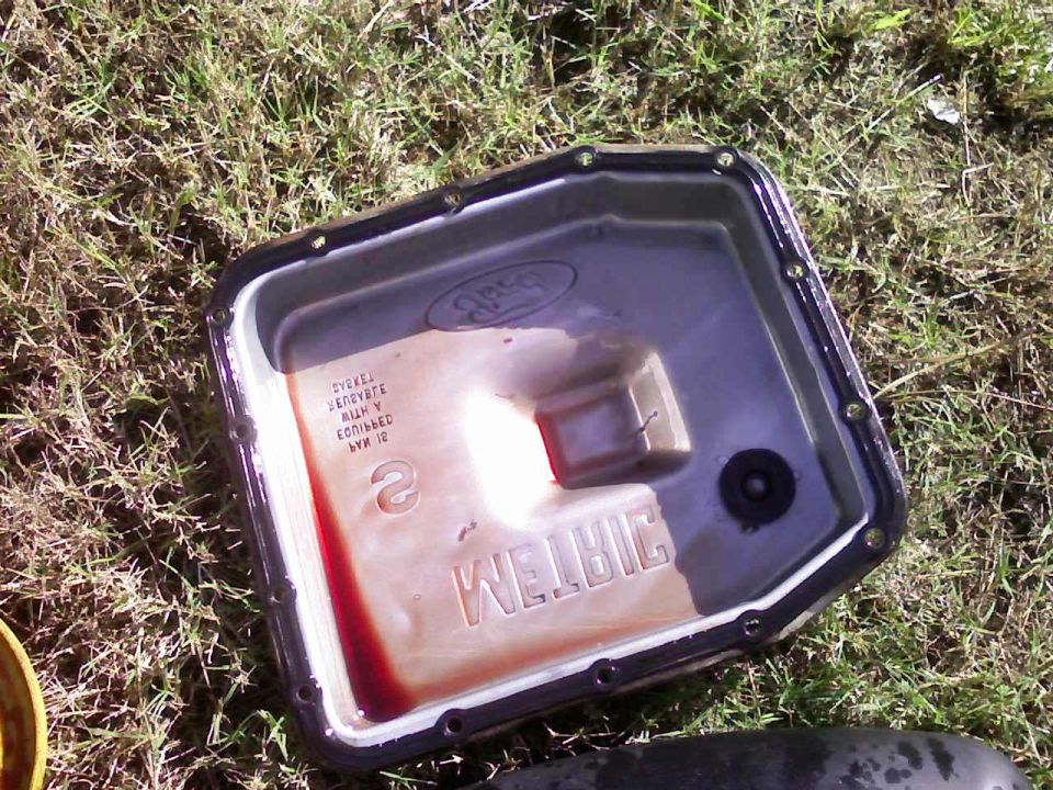Removed tranny pan, bolts are 10mm, torqued to 9-11 ft lbs.