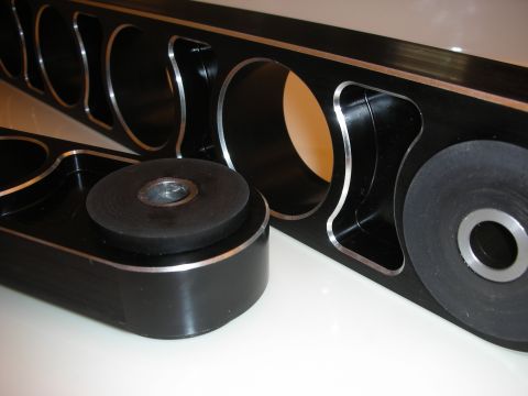 1998 Ford Crown Victoria - Close-up of custom control arms, likely for performance enhancement.