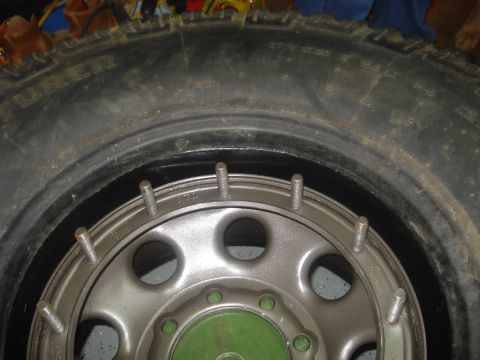 1996 Ford Bronco - rim forced into the insert.