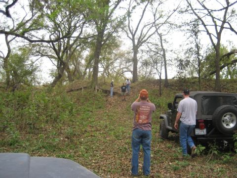 2001 Jeep Wrangler - Two Jeeps are visible in a wooded area, with several people standing around.