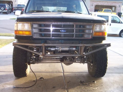 1995 Ford Bronco - Front view of a 1995 Ford Bronco a custom bumper and winch.