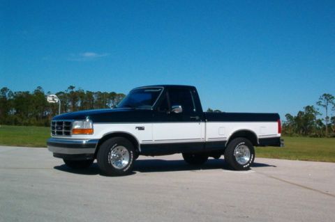 1995 Ford F-150 - This 1995 Ford F-150 pickup truck is shown from the front three-quarter view.