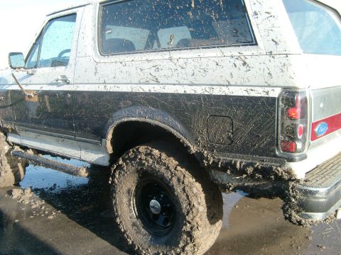 1989 Ford Bronco - This 1989 Ford Bronco is covered in mud after off-roading.