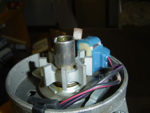 1979 Ford Bronco - Close-up view of a vehicle's distributor cap and rotor assembly, showing electrical components and wiring.
