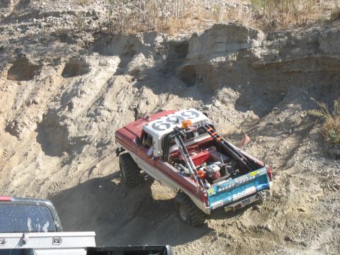 1987 Ford Bronco - This modified 1987 Ford Bronco navigates a challenging off-road course, its capabilities.