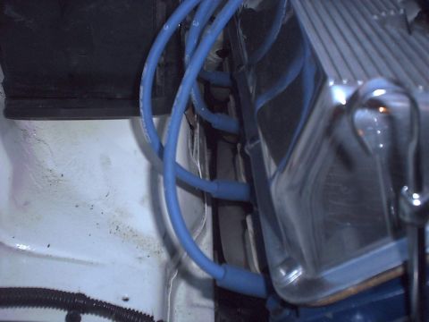 1978 Ford Mustang II - Engine bay detail showing blue spark plug wires and a chrome valve cover.