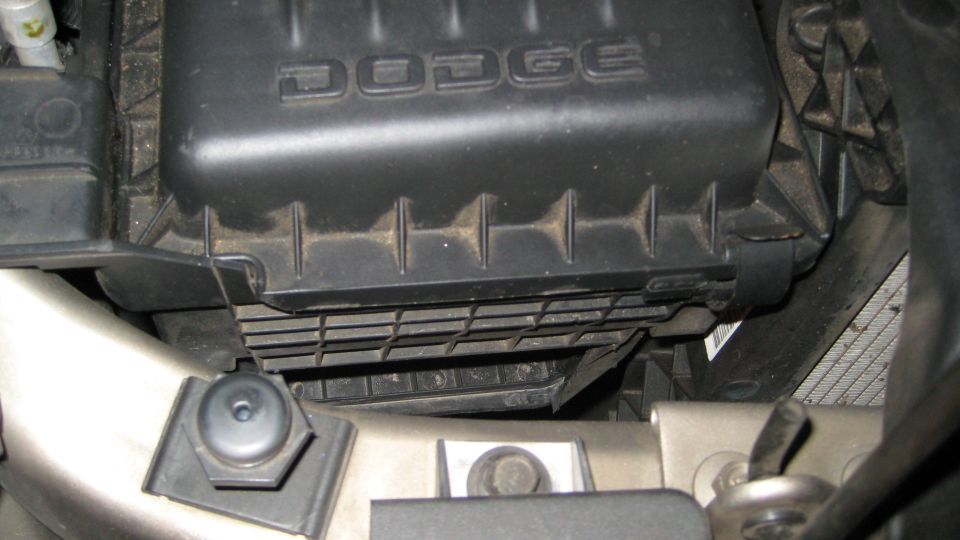 Close-up of Dodge air filter box in engine bay