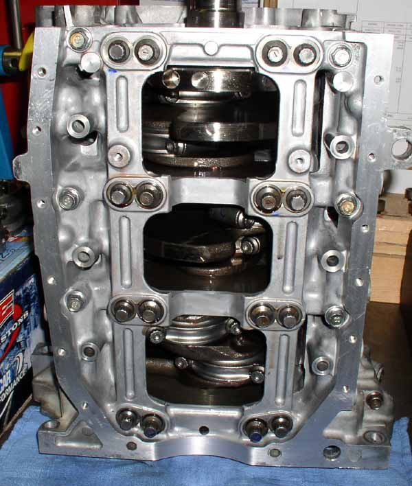 engine block with crankshaft and connecting rods visible inside