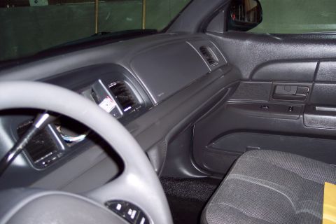 2001 Ford Crown Victoria - Interior view of a 2001 Ford Crown Victoria, likely a police interceptor model.