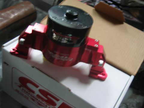 1992 Ford Mustang - A red automotive component, possibly a pump or reservoir, is shown on a white box with the CSI logo.