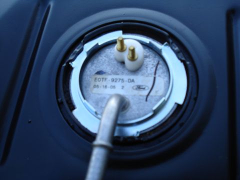 1984 Ford Bronco - Close-up of a fuel pump assembly, showing part numbers and manufacturer markings.