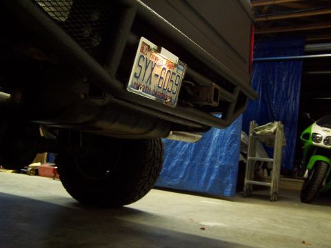 1983 Ford Bronco - license plate frame w/light. i think i want to make some superbright leds fit inside of it.